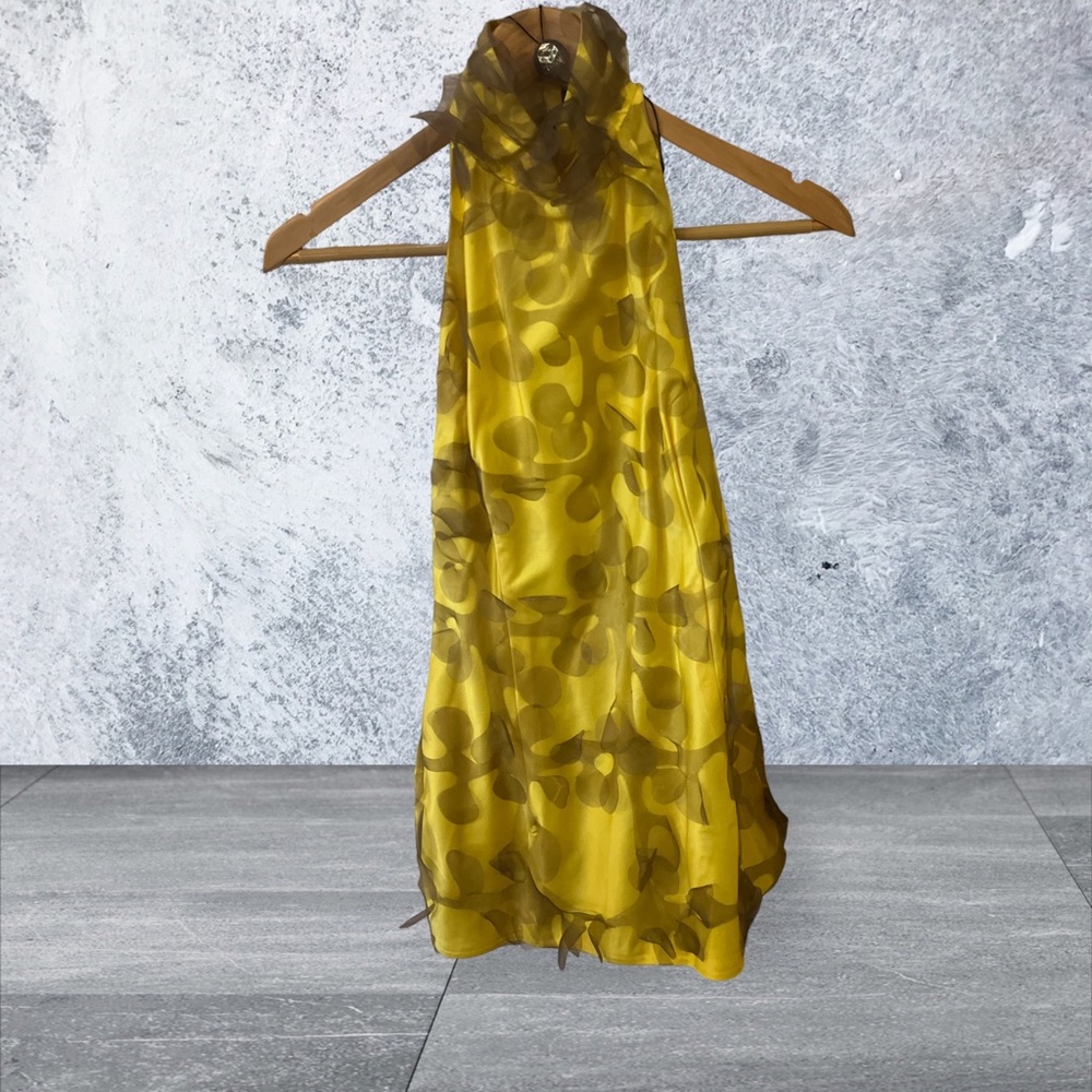 KOEL size small. Backless top with zipper. New With Tags